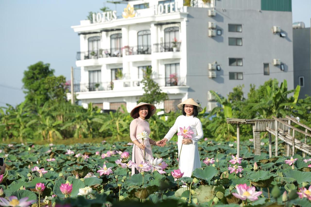 Lotus Hotel Нин Бин Екстериор снимка