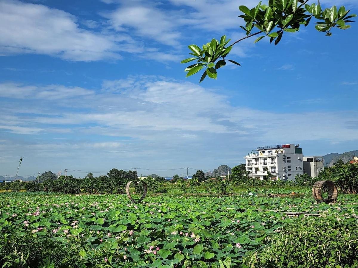 Lotus Hotel Нин Бин Екстериор снимка